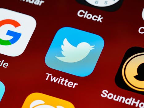 Detailed close-up image of popular social media icons on a smartphone screen.